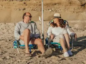 Happy couple enjoying the beach