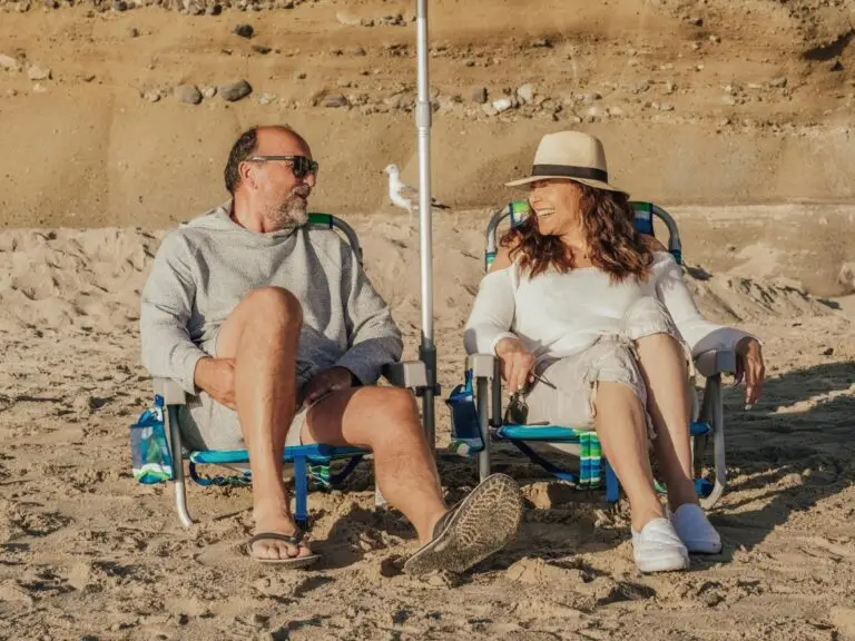 Happy couple enjoying the beach